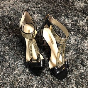 Black and gold heels